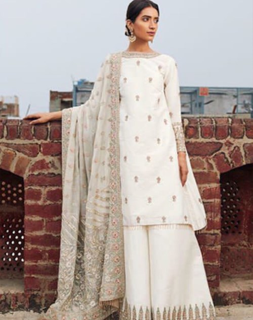This white formal with delicate handwork has already made a special place in our heart!