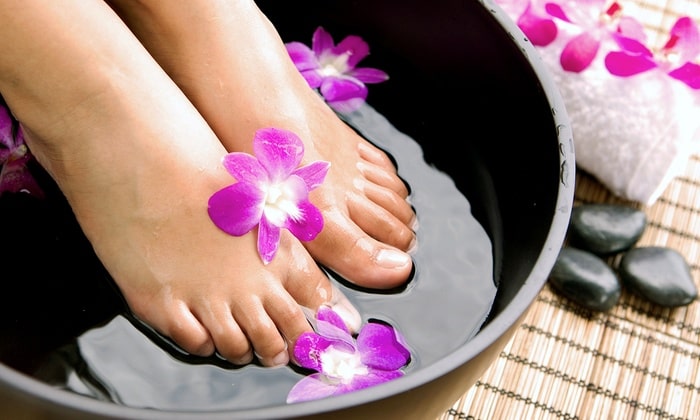 Foot bath with warm water 