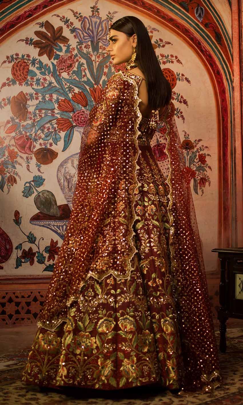 Bridal lehenga paired with brown color heavily embellished choli